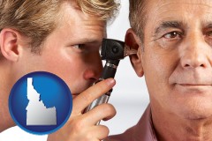 idaho an audiologist examining the ear of a patient